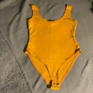 Mustard body suit